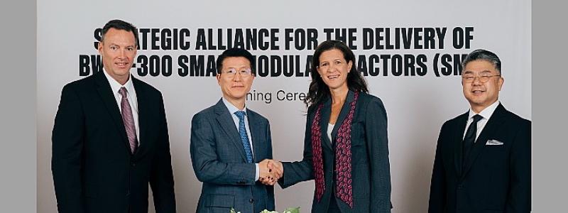 Från vänster: Jason Cooper (vd för Advanced Nuclear, GVH), Se-chul Oh (vd Samsung C&T), Maví Zingoni (vd Power, GE Vernova) och Jung E. Kim (chef för Nuclear Sales & Business Development, Samsung C&T) vid undertecknandet av samarbetet. Foto: GVH